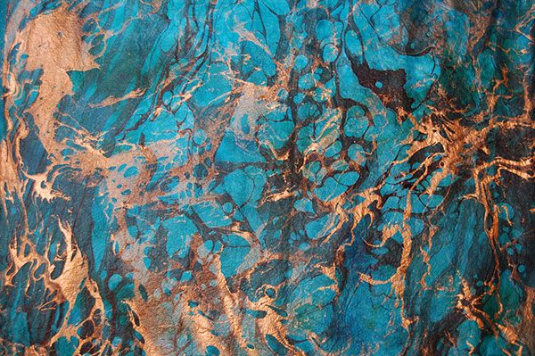 Hand-painted Malaysian batik fabric in traditional floral patterns