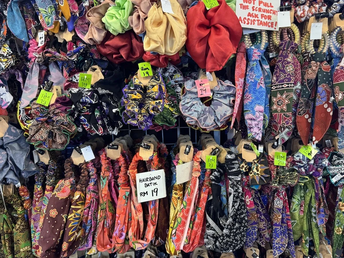 Souvenir stalls at Central Market Kuala Lumpur with batik, handicrafts and Malaysian products