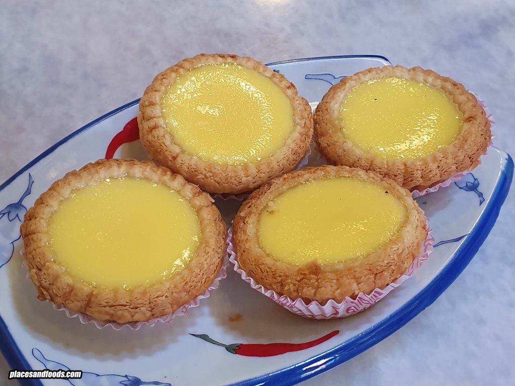 Freshly baked egg tarts at Bunn Choon bakery in Chinatown, Kuala Lumpur