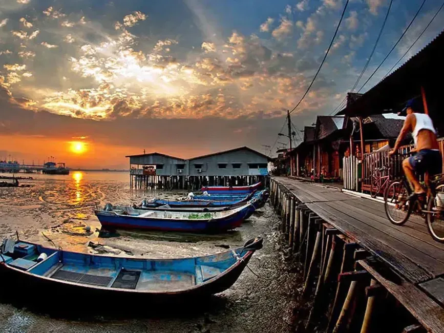 Wooden stilt houses along the main walkway of Chew Jetty, Weld Quay, George Town, Penang
