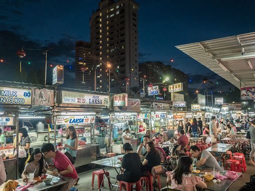Evening crowd at Gurney Drive Hawker Centre with multiple food stalls