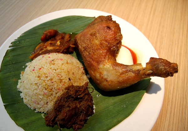 Nasi lemak with beef rendang at Madam Kwan's restaurant in Suria KLCC, Kuala Lumpur