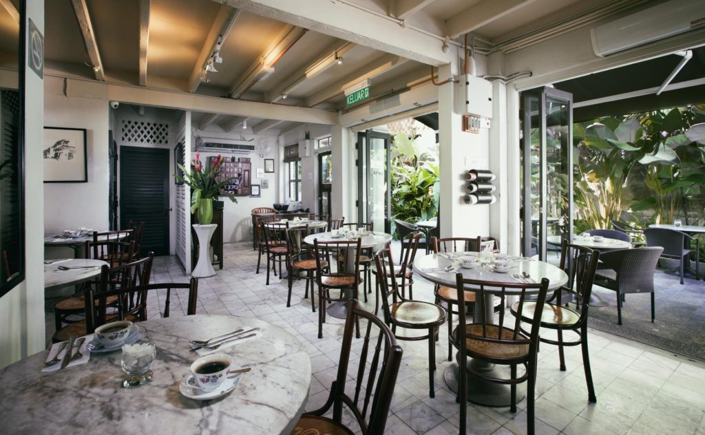 Courtyard dining at Mews Cafe inside Muntri Mews hotel, George Town
