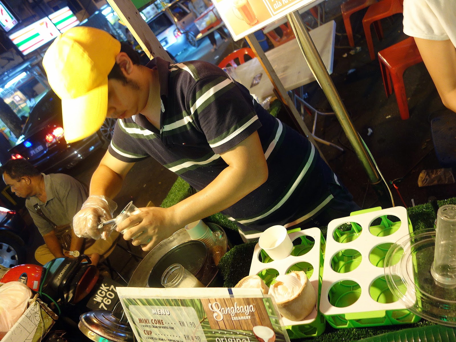 Coconut ice cream served in a halved coconut shell at Sangkaya, Kuala Lumpur
