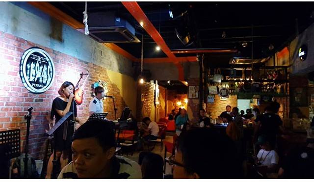 Live music and neon signage at Slippery Senoritas on Upper Penang Road