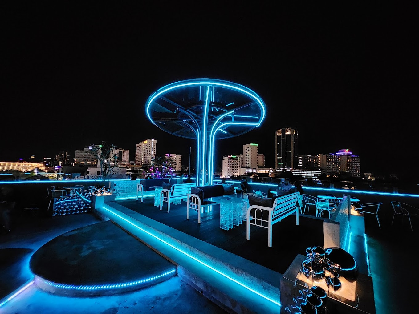 Space-themed interior with blue lighting at Sphere Rooftop Bar, Penang