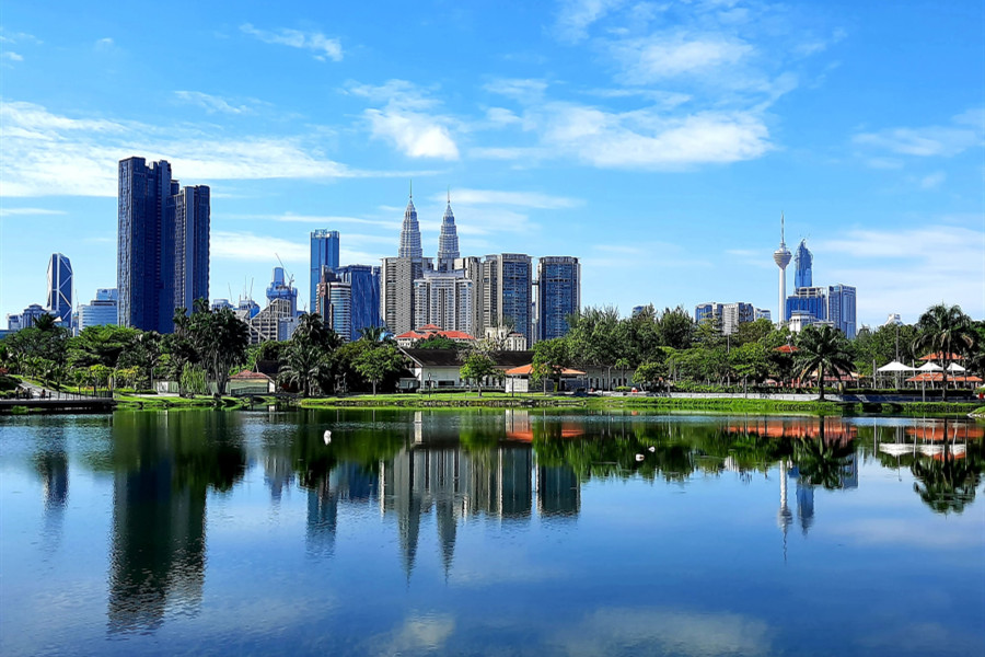 Kuala Lumpur skyline reflected in Titiwangsa Lake at night