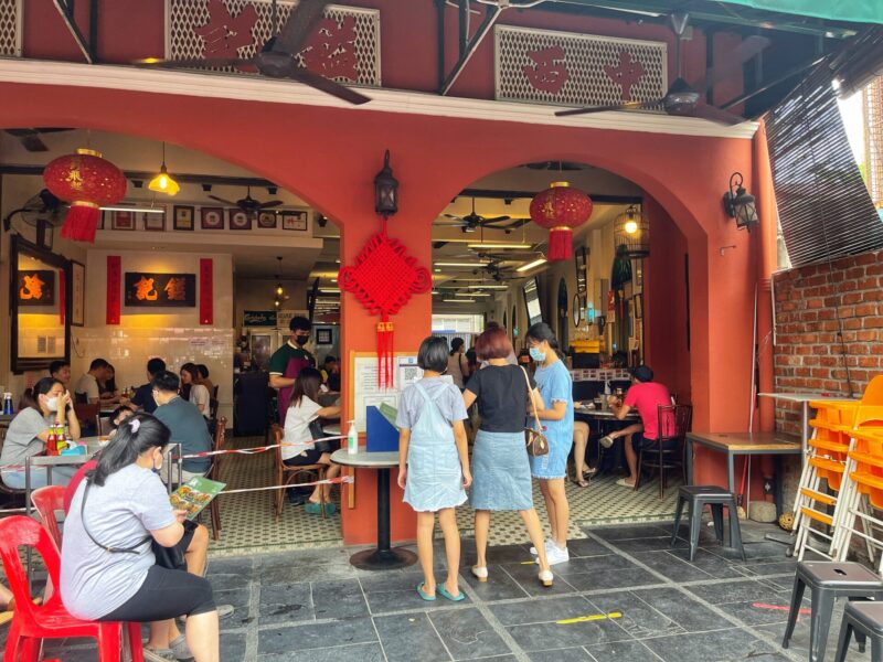 Roti babi and Hainanese pork chop plated at Yut Kee kopitiam in Kuala Lumpur